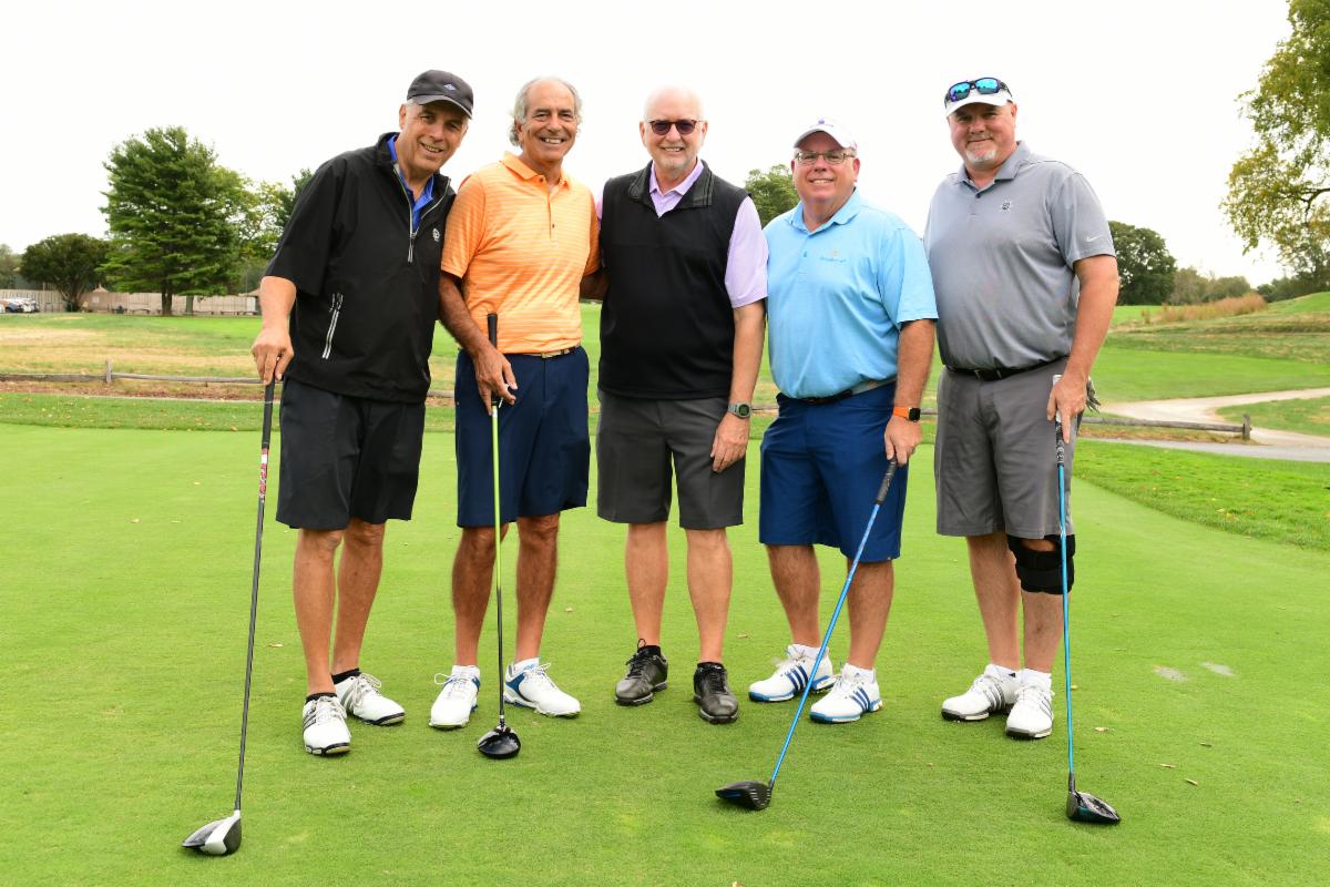 People Golfing