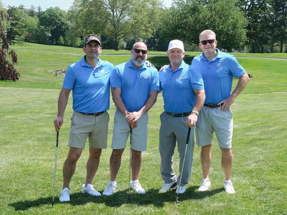 Golf foursome participating in Smile Farms’ 12th Annual Golf Outing.